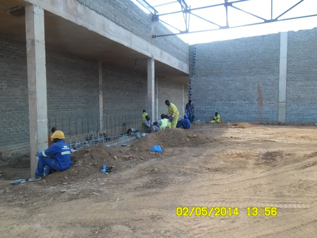 MK Production crew working inside the Mukuba Mall structure under the roof