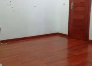 Polished wooden floor in a finished room